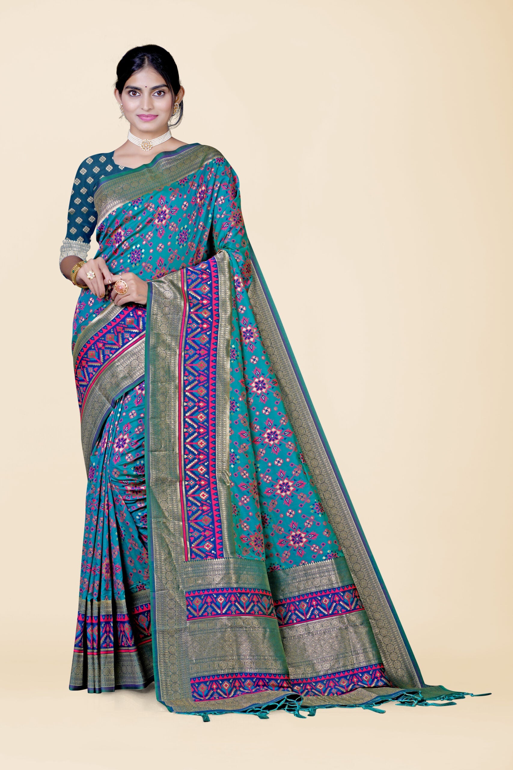 Rama Green Threadwork Patola Silk Saree 