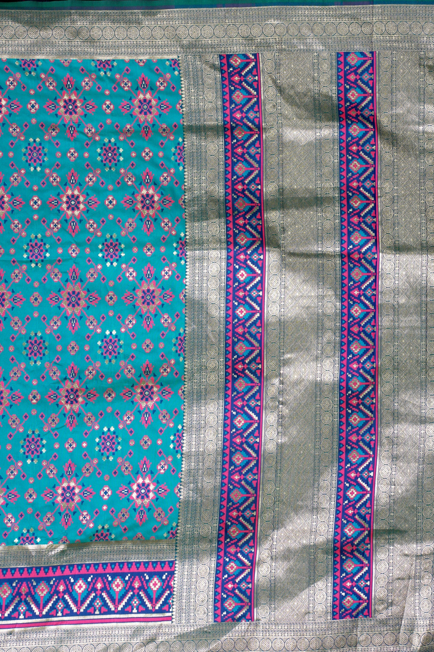 Rama Green Threadwork Patola Silk Saree 