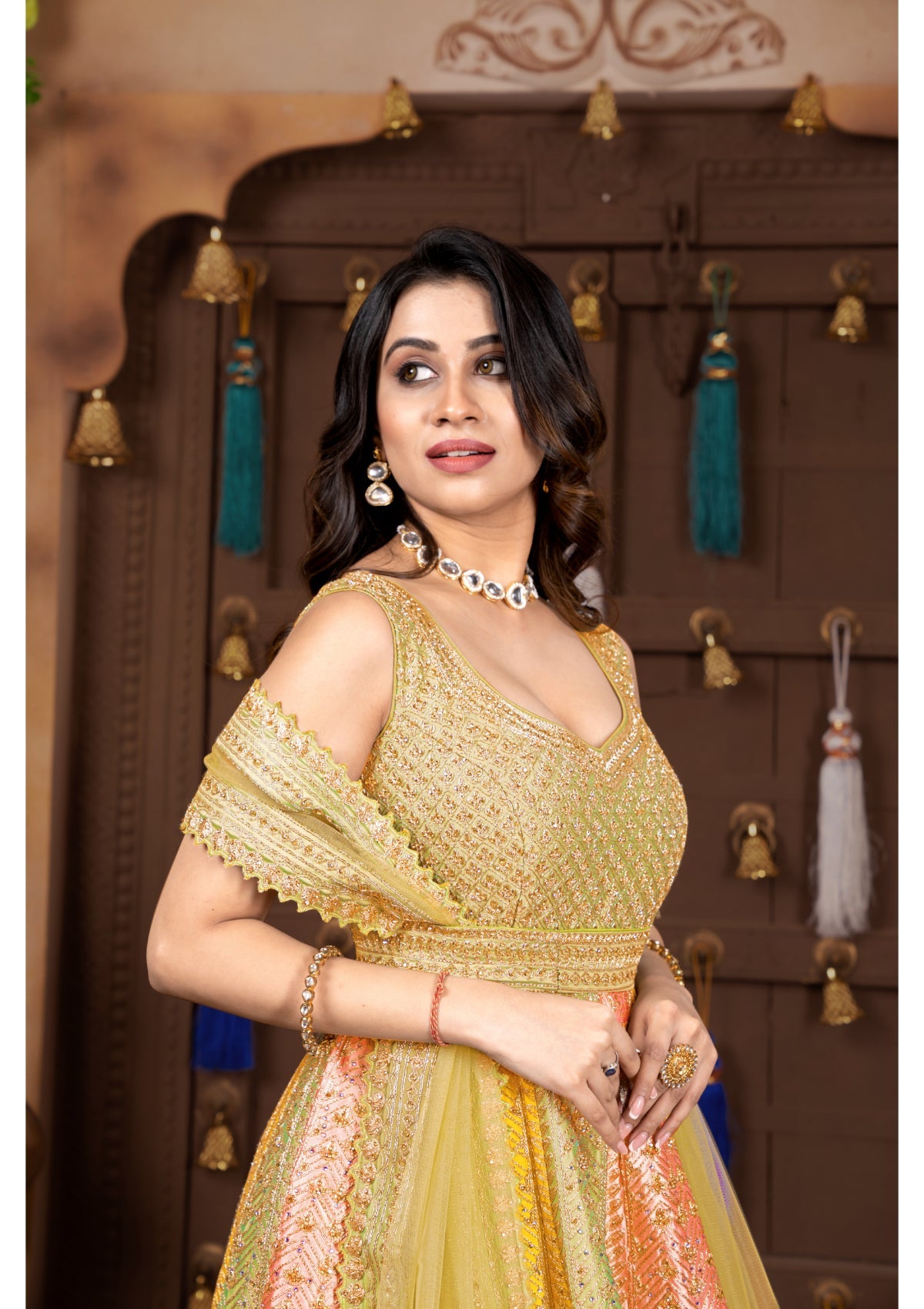 Multicolor stone work and pure Silk aari Lehenga 